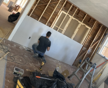 Professional drywall installer